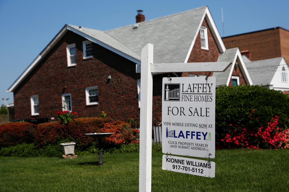 A ‘for sale’ is seen outside a single family house in Uniondale, New York. U.S. REUTERS/Shannon Stapleton