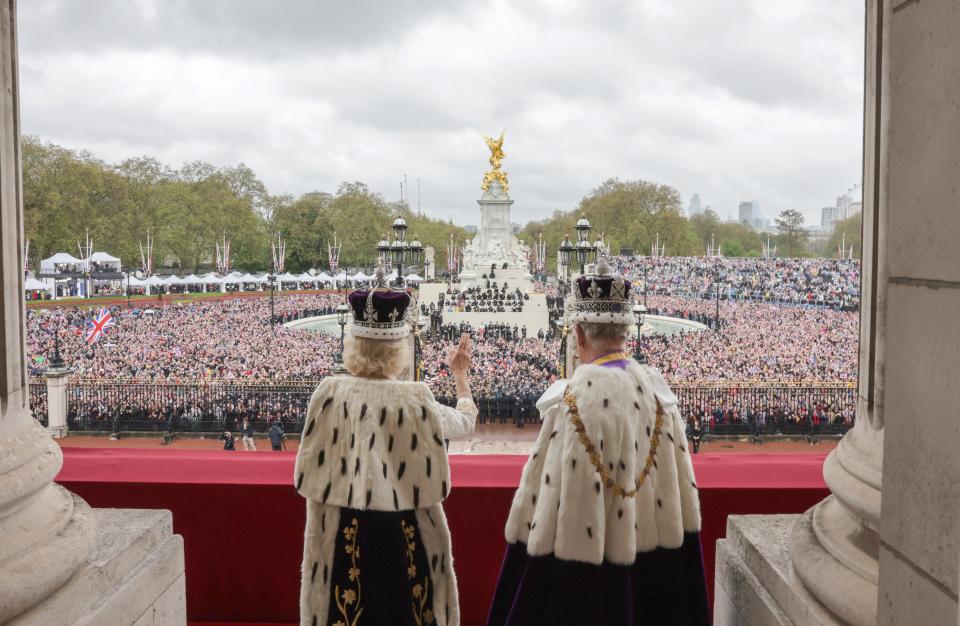 King Charles and Queen Camilla on the balcony of Buckingham Palace after the coronation.