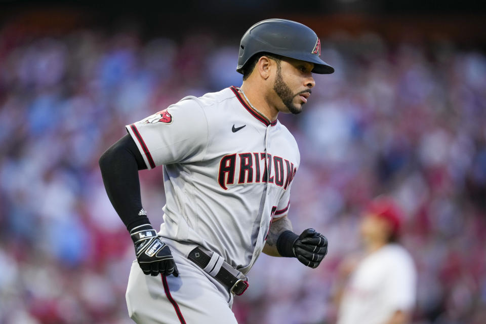 Arizona Diamondbacks' Tommy Pham rounds the bases after a home run off Philadelphia Phillies starting pitcher Aaron Nola during the second inning in Game 6 of the baseball NL Championship Series in Philadelphia Monday, Oct. 23, 2023. (AP Photo/Matt Slocum)