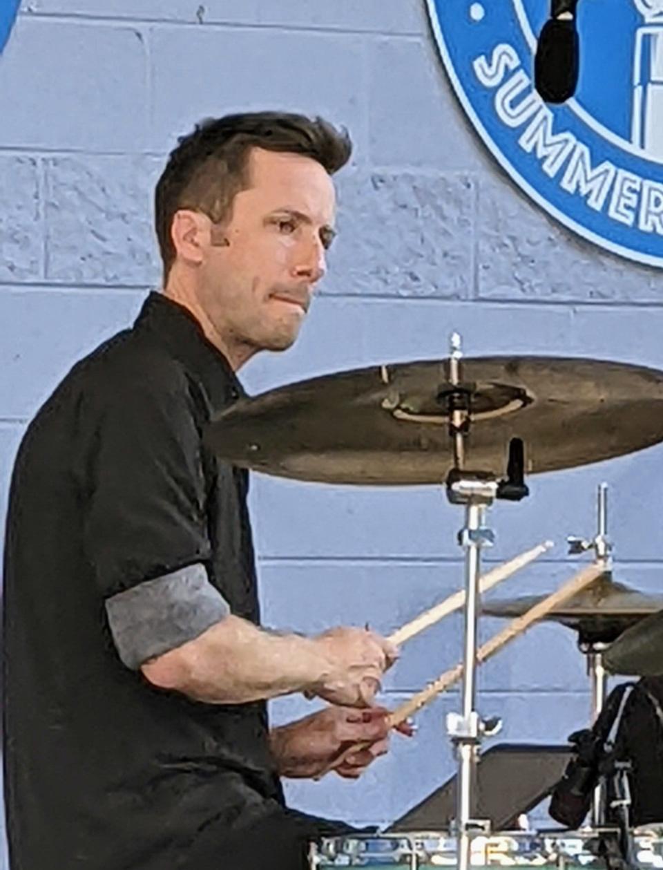 Dave Racine (at drum kit).