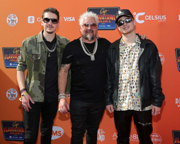 Guy Fieri (center) with his son Hunter (left) and nephew Jules (right), who he raised after the death of his sister in 2011.<p>Photo by Ethan Miller/Getty Images</p>