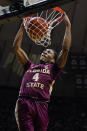 Florida State guard Caleb Mills (4) gets a dunk against Purdue during the first half of an NCAA college basketball game in West Lafayette, Ind., Tuesday, Nov. 30, 2021. (AP Photo/Michael Conroy)