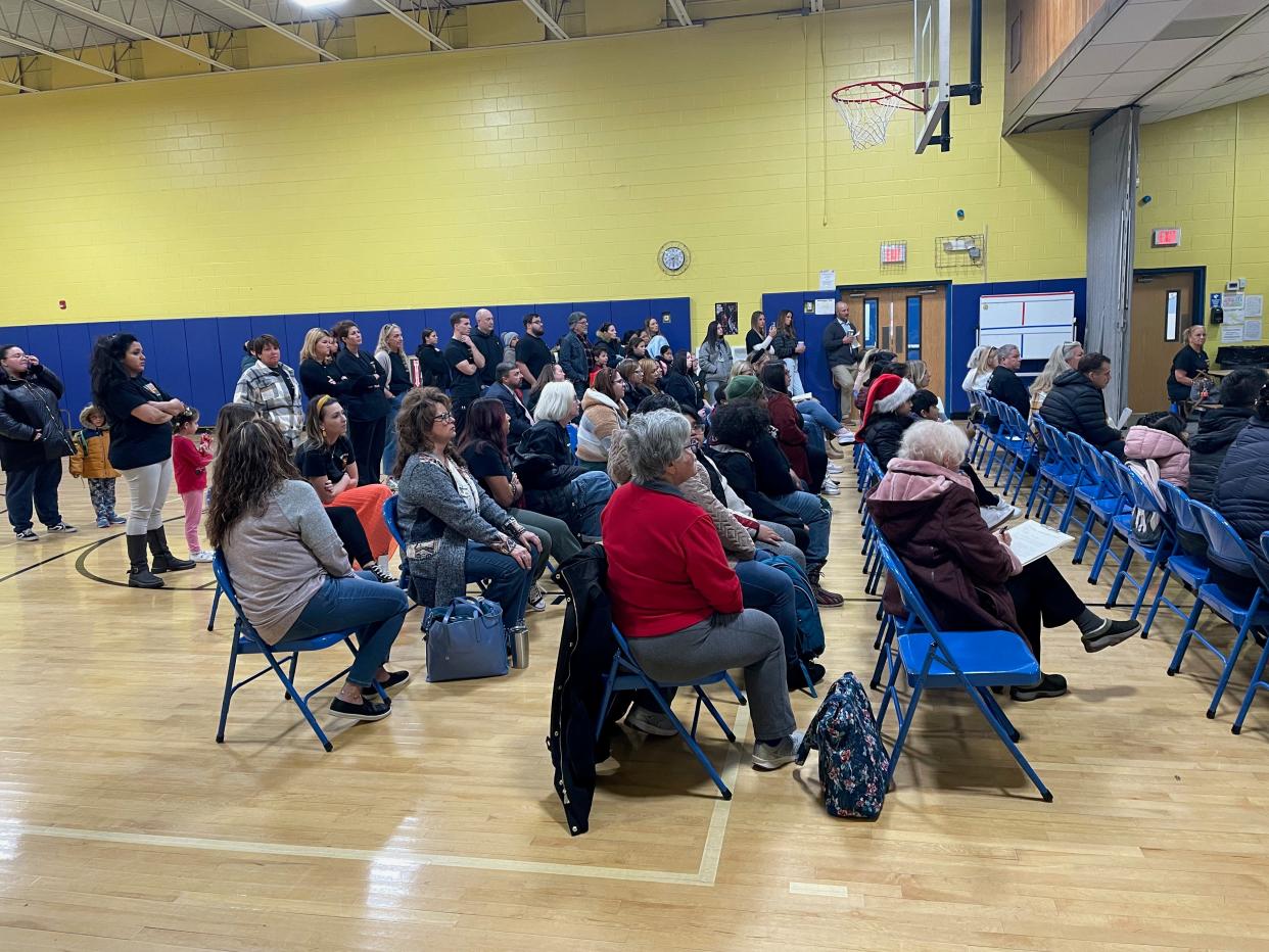 Parents gathered at the Hugh J. Boyd Jr. Elementary School in Seaside Heights on Friday, Dec. 8, 2023, to object to a plan to close the school and send students to Toms River Regional School District.