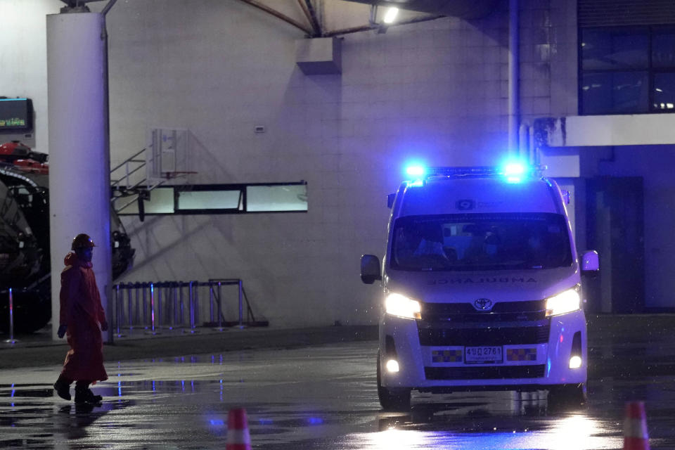 An ambulance waits to transport passengers from a London-Singapore flight that encountered severe turbulence, in Bangkok, Thailand, Tuesday, May 21, 2024. The plane apparently plummeted for a number of minutes before it was diverted to Bangkok, where emergency crews rushed to help injured passengers amid stormy weather, Singapore Airlines said Tuesday. (AP Photo/Sakchai Lalit)