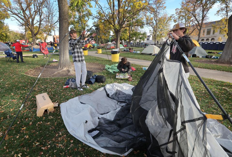 University of Utah students Michael Moore and Cooper Strahm set up their tent to camp out on Presidents Circle for the “College GameDay” broadcast in Salt Lake City on Friday, Oct. 27, 2023. | Jeffrey D. Allred, Deseret News