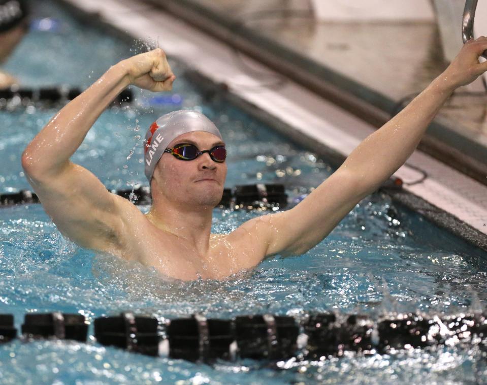 Lucas Lane of Dover reacts after the DII boys 200 yard freestyle prelims during the state swimming and diving championships at C.T. Branin Natatorium in Canton on Thursday, Feb. 24, 2022.