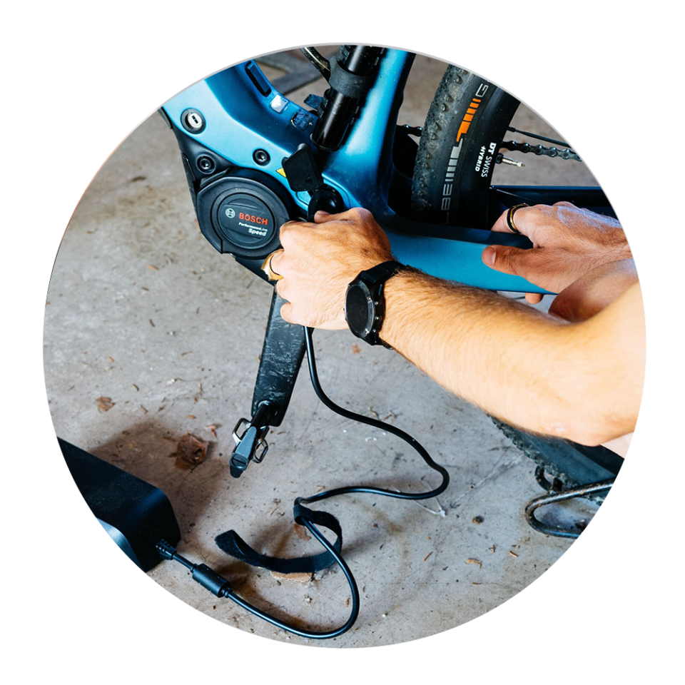 a person working on an ebike