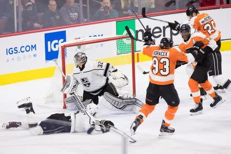 Feb 7, 2019; Philadelphia, PA, USA; Philadelphia Flyers right wing Jakub Voracek (93) reacts with right wing Wayne Simmonds (17) after scoring past Los Angeles Kings goaltender Jonathan Quick (32) and defenseman Drew Doughty (8) during the third period at Wells Fargo Center. Mandatory Credit: Bill Streicher-USA TODAY Sports