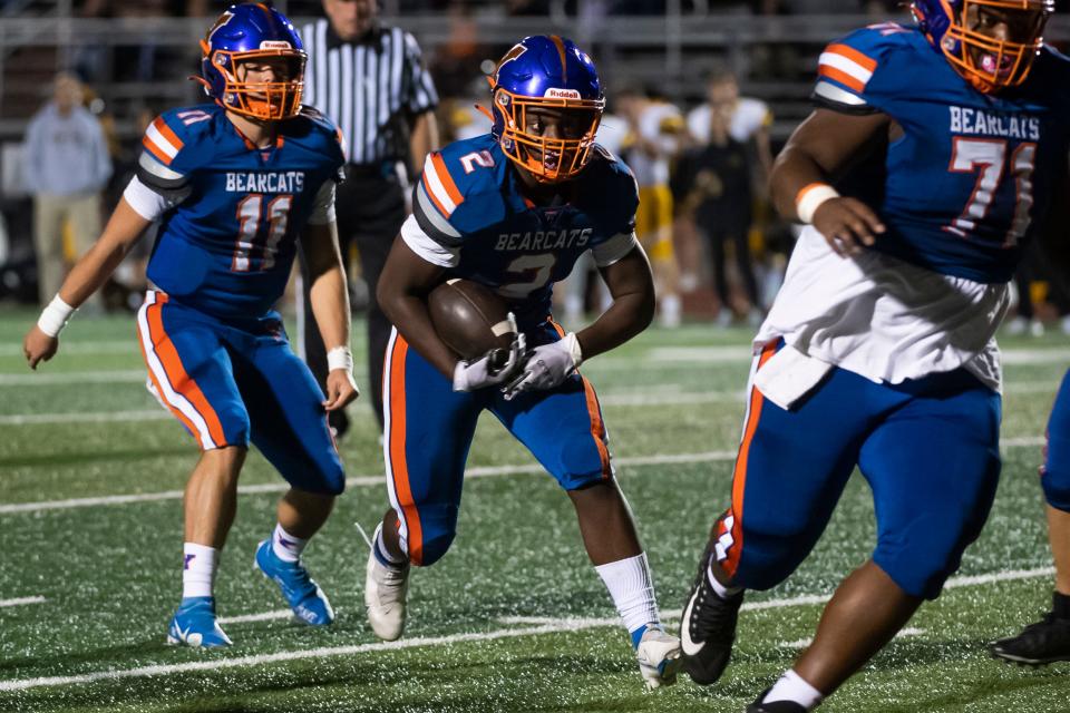 York High freshman running back Amani Bones (2) follows offensive lineman Jalen Walker (71) while carrying the ball against Red Lion at Small Athletic Field on Friday, September 23, 2022. Bones made it into the end zone but the play was called back due to a penalty.