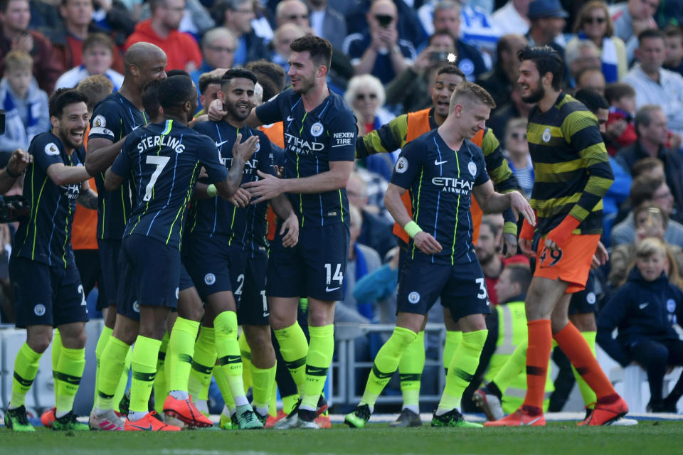 Riyad Mahrez celebrates with teammates after scoring Manchester City's third. (Credit: Getty Images)