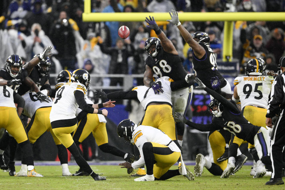 Pittsburgh Steelers kicker Chris Boswell (9) kicks the game-winning field goal against the Baltimore Ravens during overtime of an NFL football game, Sunday, Jan. 9, 2022, in Baltimore. The Steelers won 16-13. (AP Photo/Nick Wass)