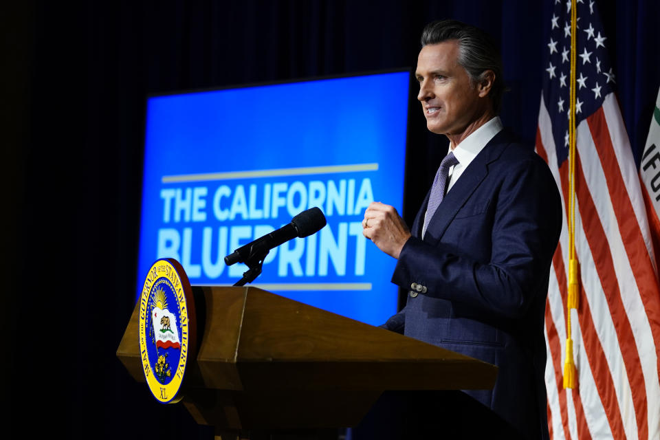 California Gov. Gavin Newsom unveils his proposed 2022-2023 state budget during a news conference in Sacramento, Calif., Monday, Jan. 10, 2022. (AP Photo/Rich Pedroncelli)