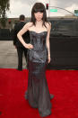 <b>Carly Rae Jepsen</b><br> <b>Grade: B+</b><br> Canadian songstress Carly Rae Jepsen looked like a lovely mermaid in her shimmering Roberto Cavalli creation. "I tried on like eight different ones before I knew," she told Ryan Seacrest on the red carpet. Her signature heavy bangs and some blue eye shadow completed her look.