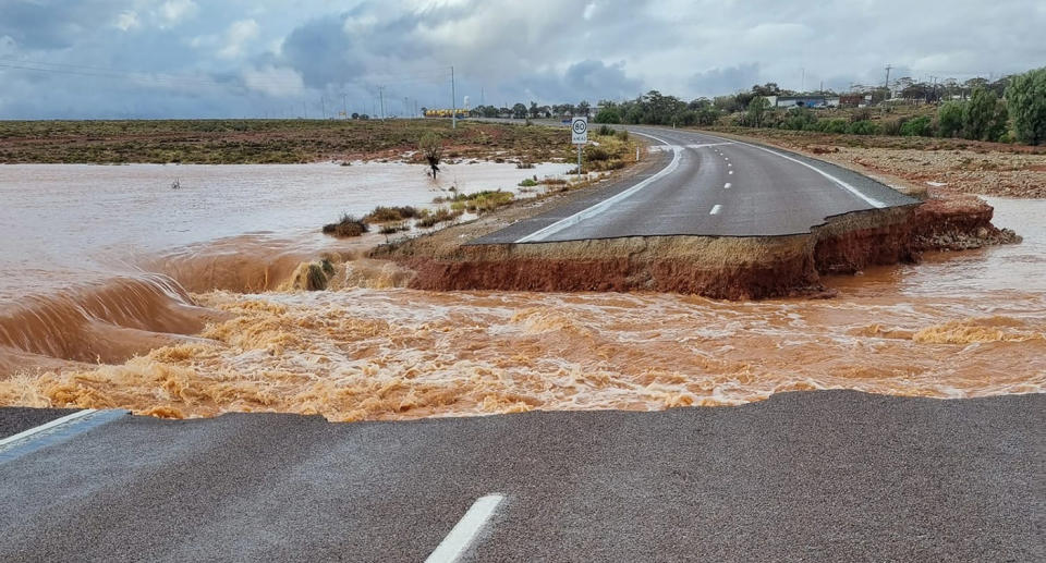 A section of road was washed away between Pimba and Woomera on the Stuart Highway in South Australia. Source: Spud's Roadhouse/ Facebook