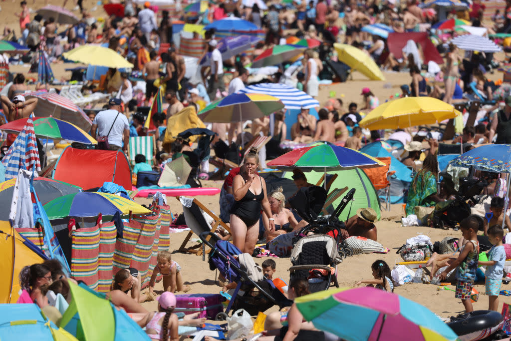 Health Alert Raised As Hot Weather Continues Across The UK