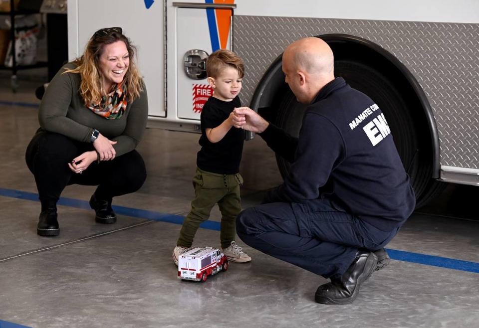 Julia Backus and her son, Nolan Backus, 2 1/2, got to meet the Manatee County charge paramedic Kevin Guido, 36, who treated him in an ambulance after he suffered a seizure at his daycare in March.