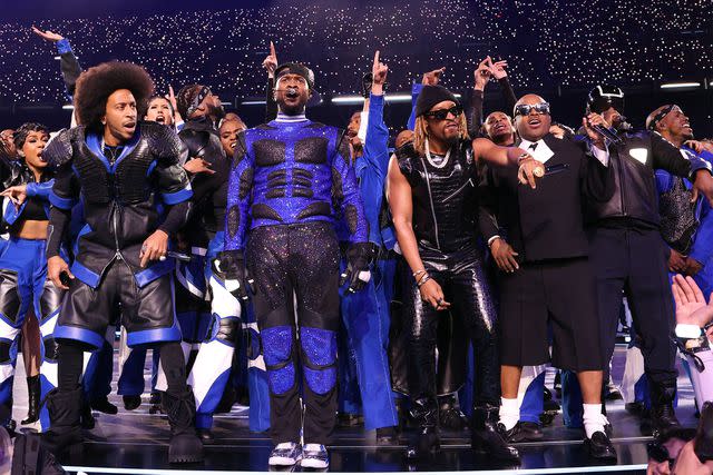 <p>Kevin Mazur/Getty</p> Ludacris, Usher, Lil Jon, Jermaine Dupri, and will.i.am on stage during the Super Bowl halftime show.