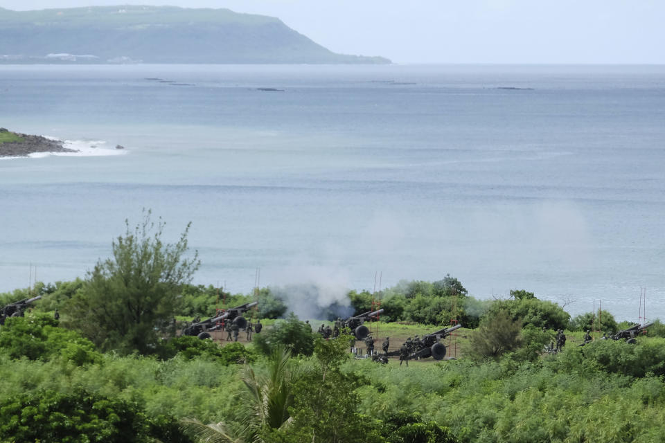 CORRECTS DATE - Taiwan military conducts artillery drills in Fangshan township, Pingtung, southern Taiwan, Tuesday, Aug. 9, 2022. Taiwan's official Central News Agency reported that Taiwan's army will conduct live-fire artillery drills in southern Pingtung county on Tuesday and Thursday, in response to the Chinese exercises. (AP Photo/Johnson Lai)