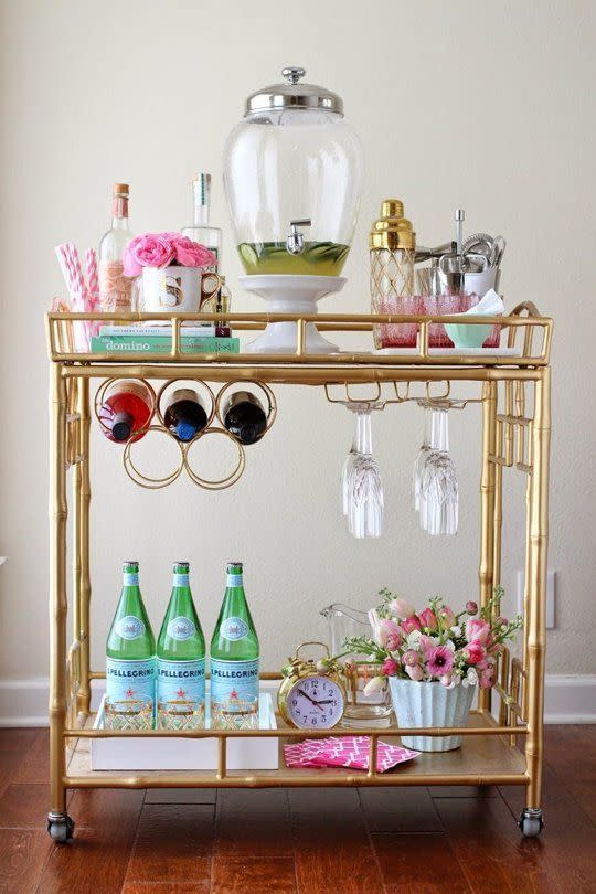 The Oh-So-Chic Cocktail Trolley Every girl’s gold-coated dream, the styling on this cockatil cart is what makes it. From the gold-topped cocktail shaker to the two-tone straws, it screams “YOU WANT ME”. And we do. We really do.