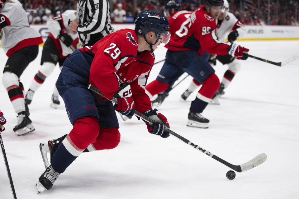 Washington Capitals center Hendrix Lapierre (29) skates with the puck during the second period of an NHL hockey game against the Ottawa Senators, Monday, Feb. 26, 2024, in Washington. (AP Photo/Manuel Balce Ceneta)