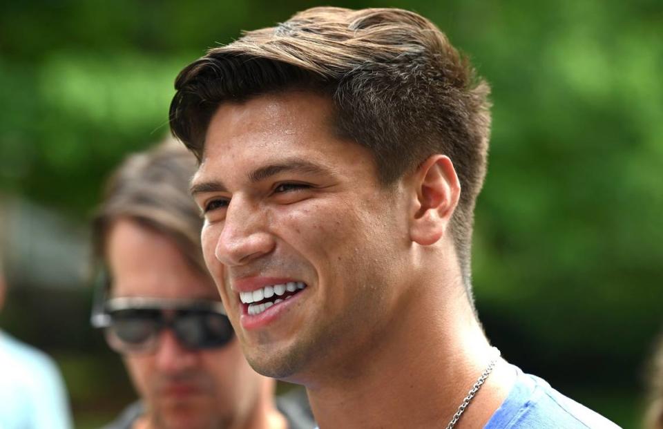 Carolina Panthers quarterback Matt Corral answers questions from the media in the summer of 2022. His season was cut short due to a Lisfranc foot injury, but he’s healthy again going into the 2023 system.