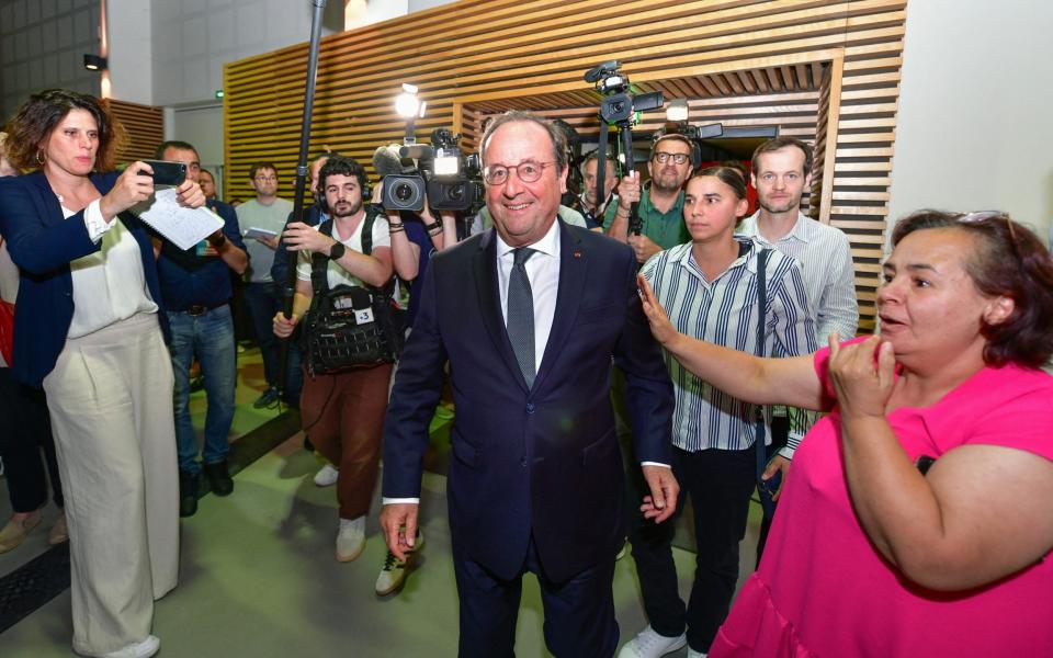 Mr Hollande at an election night event