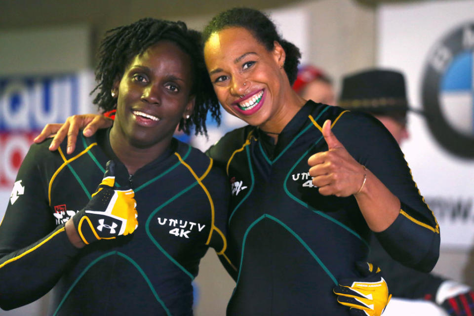 Carrie Russell (left) and Jazmine Fenlator-Victorian are part of Jamaica’s first women’s bobsled team. (Getty)