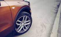 <p>The model we tested came wearing $625 in glittering orange paint and $1100 20-inch wheels (18s are standard), lending it a concept-car air.</p>