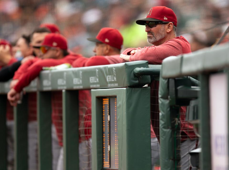 Arizona Diamondbacks manager Torey Lovullo (right) watches his team take on the San Francisco Giants during the first inning at Oracle Park in San Francisco on Aug. 3, 2023.