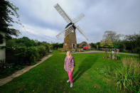 A homeowner has completed the ultimate lockdown DIY project at one of Britain's last fully-working windmills - after using a cherry picker to paint the sails by hand. Jeanette McGarry, 58, painstakingly spent three weeks touching up the paintwork on the gigantic five tonne sails as part of a refurbishment of historic Berkswell Windmill. The 70ft tall Grade II-listed building has been standing for nearly 200 years in the village of Balsall Common, West Mids., and was bought by Jeannette in 2005. She then spent £200,000 restoring the 19th century four-bladed tower mill to its former glory with the help of English Heritage after it fell into a state of disrepair.