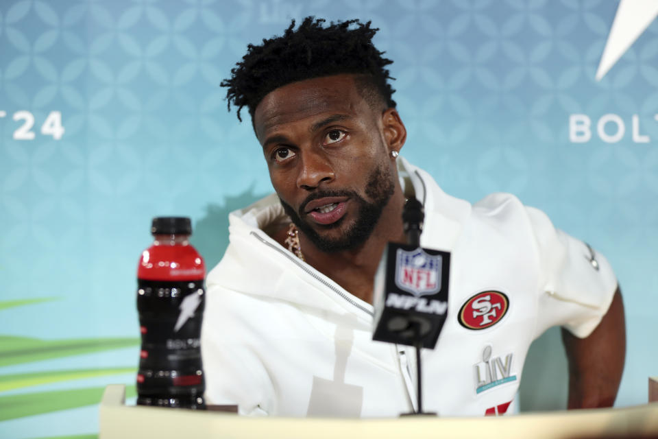 FILE - Then-San Francisco 49ers wide receiver Emmanuel Sanders speaks to the media during Opening Night for the NFL Super Bowl 54 football game in Miami, in this Monday, Jan. 27, 2020, file photo. New Orleans Saints first-year receiver Emmanuel Sanders is trying to reach his fourth Super Bowl with a fourth different team. (AP Photo/Steve Luciano, File)