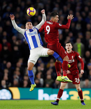 Soccer Football - Premier League - Brighton & Hove Albion v Liverpool - The American Express Community Stadium, Brighton, Britain - January 12, 2019 Brighton's Anthony Knockaert in action with Liverpool's Roberto Firmino Action Images via Reuters/Paul Childs