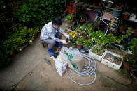 Royal aficionado Fumiko Shirataki, 78, enjoys gardening at her home in Kawasaki, Japan, April 21, 2019. REUTERS/Issei Kato