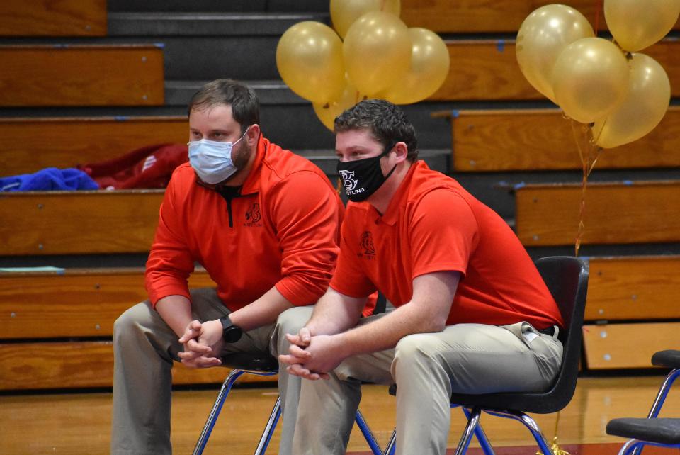 Bryan County High School wrestling assistant coach Brad Godbee, left, and head coach Zach Ledbetter.