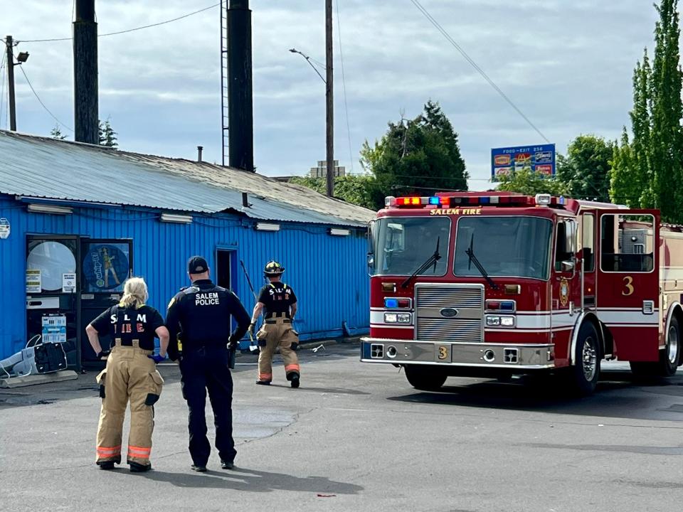 A two-alarm commercial fire Friday morning gutted the south end of the Spice Adult Emporium on Silverton Road NE.