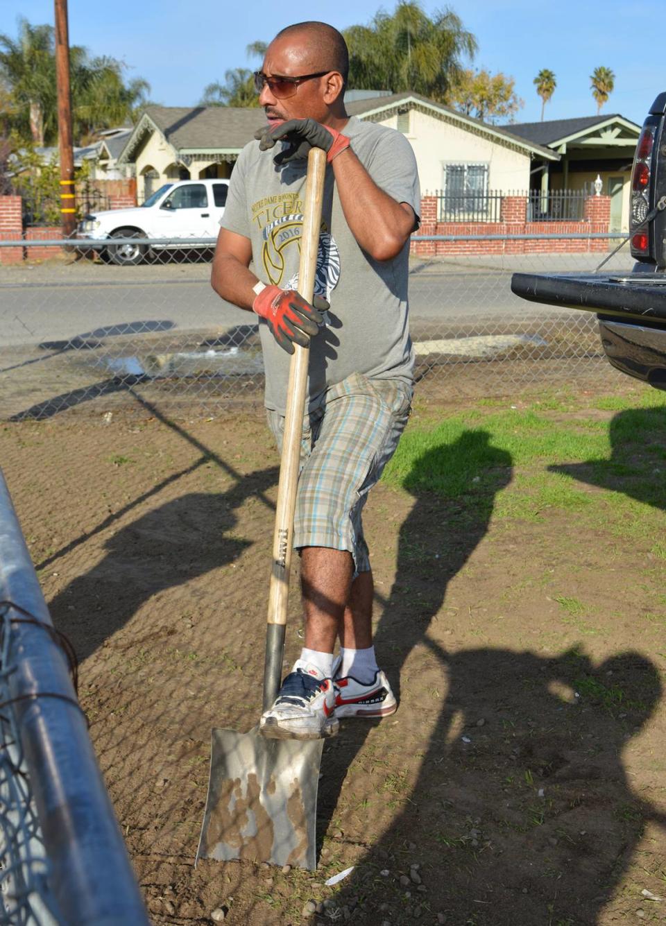 Jose Vasquez lives along a south Modesto CA street that will get sidewalks thanks to a state grant. He said on Dec. 6, 2022, that he shovels soil from the streets after rain.