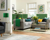 <p> 'One of my personal favorite color combos is gray and green. Specifically, look for cool, mid-tone grays with blue undertones and cooler green hues (pistachio, light olive, etc) as well. This combination adds naturalism and freshness to whatever space it is in,' says Kazimierski. </p> <p> 'My go-to colors to pair with gray in home decor are shades of green,' says Leonard Ang, CEO at iPropertyManagement. 'It provides a sharp, clean effect, and the contrast between a charcoal grey and a bright green can really pop if the green is used in moderation.' </p> <p> A grey sofa is a perfect base from which to go experimental with your wall color. Painting the lower half of your wall a bright color is a great way to ease your way into a more vibrant shade, as it doesn't overwhelm the whole room. </p>