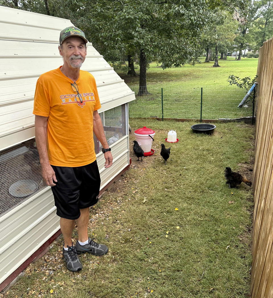 Ricky Dority, 65, poses for a photo outside at the home of his son in Greenwood, Ark.,, Friday, Sept. 22, 2023. Dority was freed in June with the help of a dogged private investigator he hired with COVID-relief funds and students at Oklahoma City University's Innocence Project who found inconsistencies in the state's account of a 1997 cold-case murder.(AP Photo/Sean Murphy)