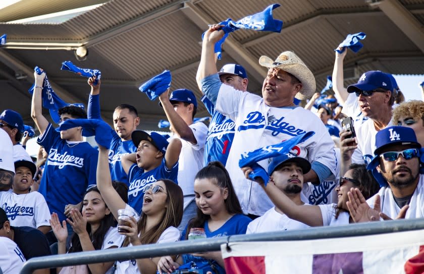 LOS ANGELES, CA - OCTOBER 3, 2019: Dodger fans cheer as the Dodgers starting line-up.