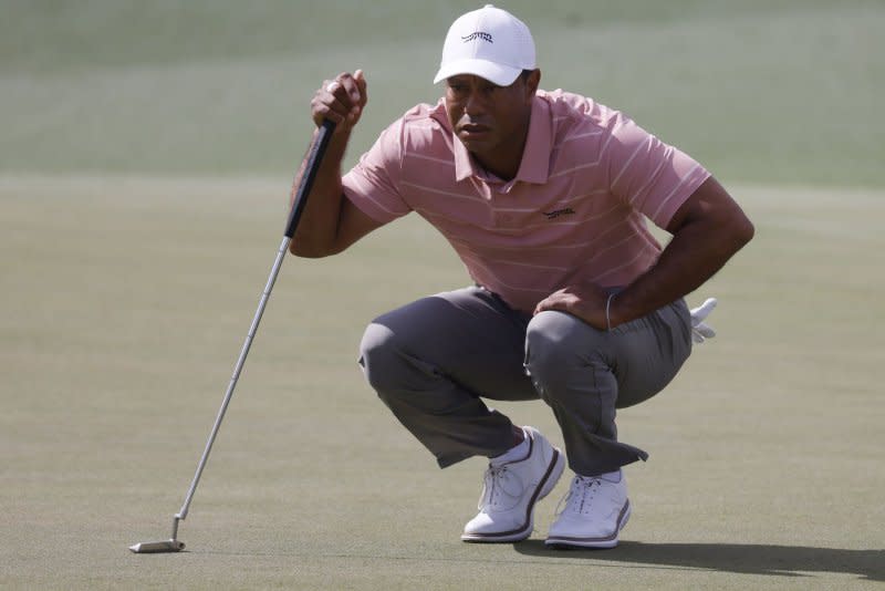 Tiger Woods lines up a putt on the second hole during the first round of the Masters Tournament on Thursday at Augusta National Golf Club in Augusta, Ga. Photo by Tannen Maury/UPI