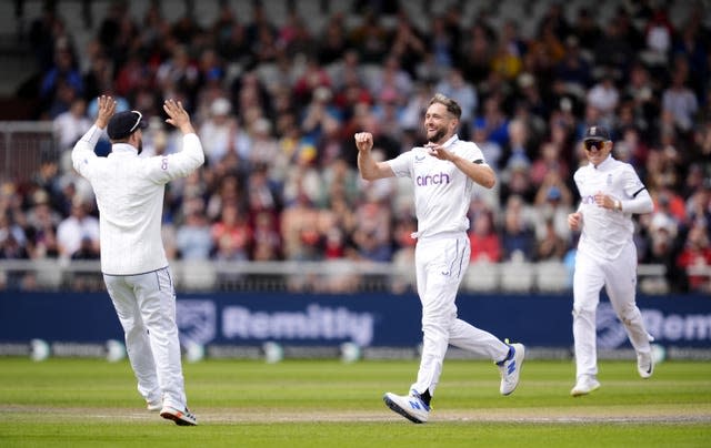 Chris Woakes celebrates taking a wicket of Sri Lanka’s Kamindu Mendis