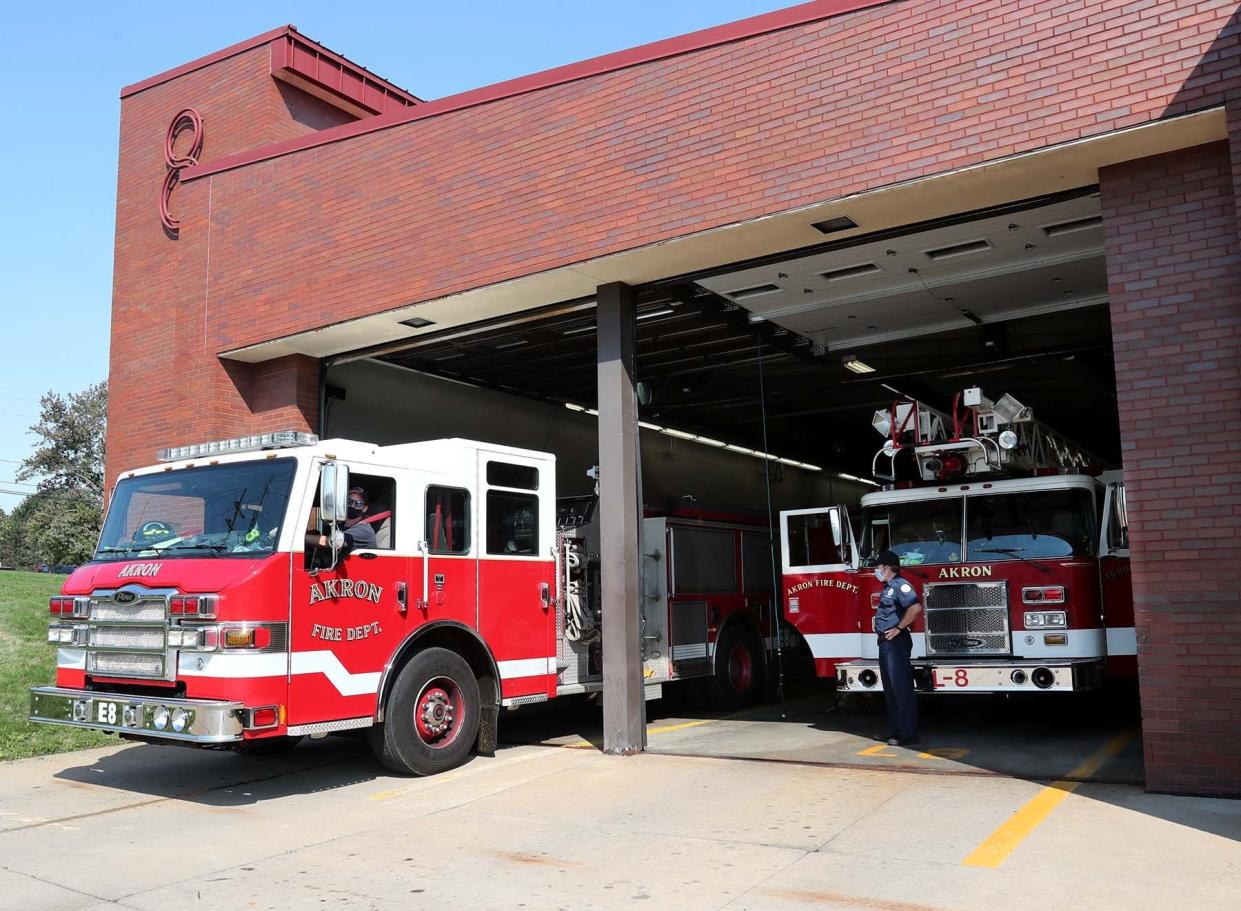 An Akron Fire Department engine crew returns from a call to Station 8 on Sept. 9, 2020 in Akron.