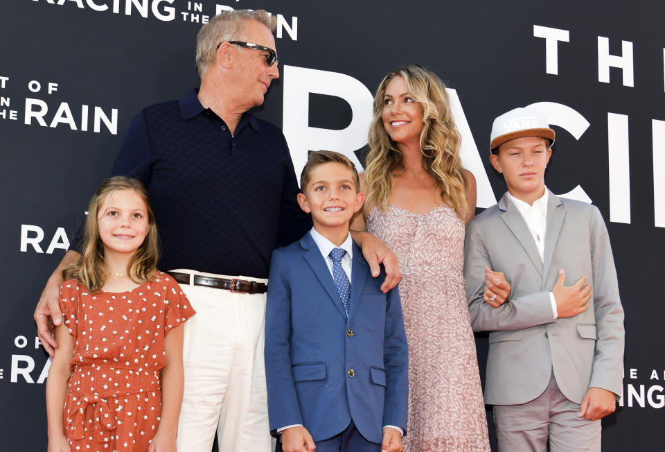 Grace Avery Costner, Kevin Costner, Hayes Logan Costner, Christine Baumgartner, and Cayden Wyatt Costner (Rodin Eckenroth / Getty Images)