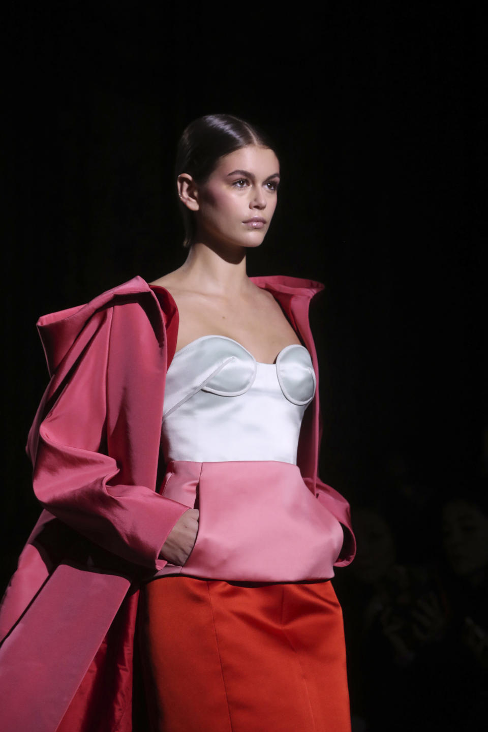 Model Kaia Gerber wears a creation for the Valentino Haute Couture Spring/Summer 2020 fashion collection presented Wednesday Jan. 22, 2020 in Paris. (AP Photo/Thibault Camus)