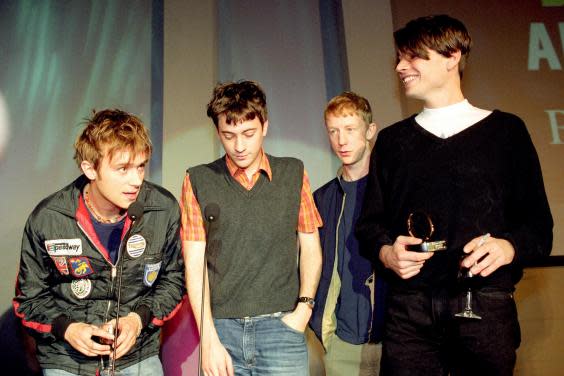 Blur pick up a Q award for best album of the year with ‘Parklife’. Despite a supposed rivalry with Oasis, most music fans owned and loved both albums (PA)