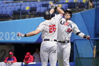 United States' Tyler Austin (23) celebrates his home run with teammate Triston Casas (26) in the fifth inning of a baseball game against the Dominican Republic at the 2020 Summer Olympics, Wednesday, Aug. 4, 2021, in Yokohama, Japan. (AP Photo/Sue Ogrocki)