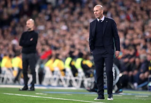 Pep Guardiola, left, go the better of Real Madrid manager Zinedine Zidane