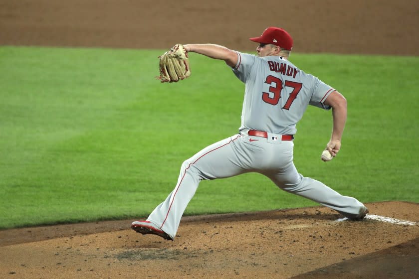 Los Angeles Angels starting pitcher Dylan Bundy throws against the Seattle Mariners.