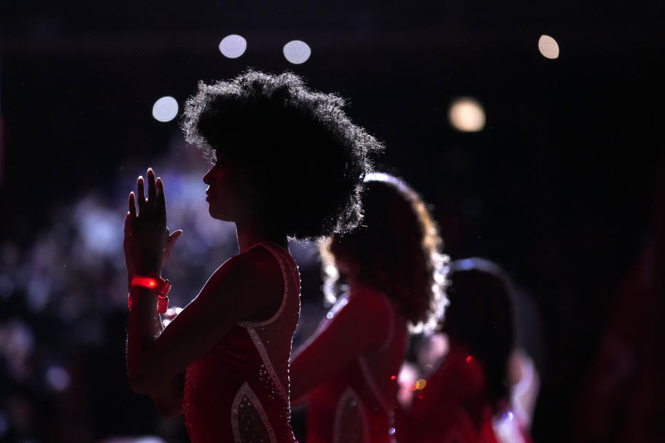 Destiny and other members of the Chicago Bulls' Luvabulls dance team perform at the start of an NBA basketball game between the Bulls and the Boston Celtics on Saturday, March 23, 2024, in Chicago. (AP Photo/Charles Rex Arbogast)