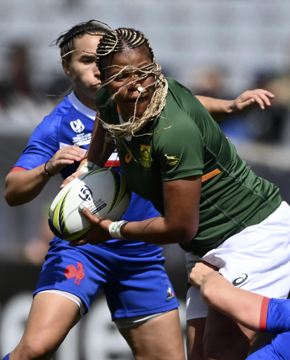 Aseza Hele of South Africa is tackled during the Women's Rugby World Cup pool match between South Africa and France, at Eden Park, Auckland, New Zealand, Saturday, Oct.8. 2022. (Andrew Cornaga/Photosport via AP)